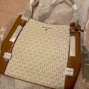 Michael Kors Tan and White Monogram Carrie Purse